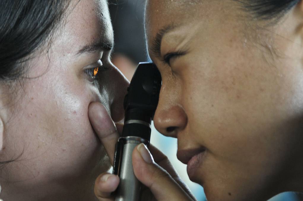 Photo of reading eye exam being performed