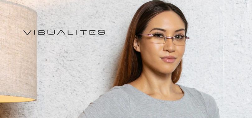 Woman wearing pink rimless reading glasses