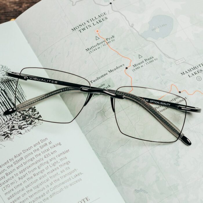 Visualites Esprit Rimless Reading Glasses On A Book