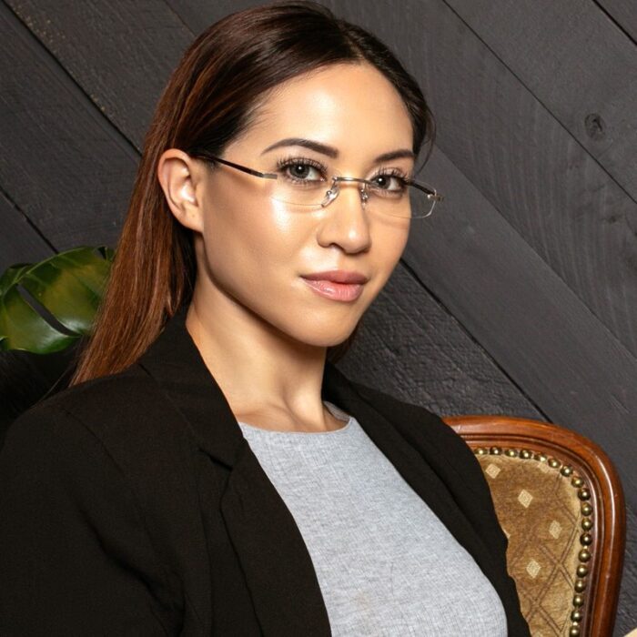 Woman Wearing Visualites X Rimless Reading Glasses