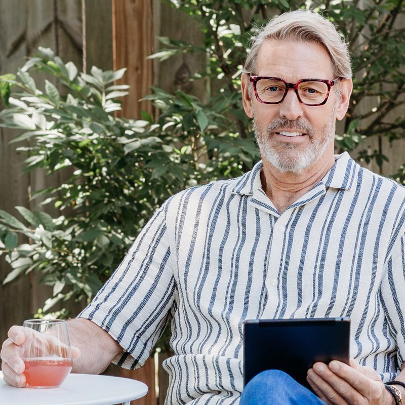 Man Wearing Blue Light Filtering Computer Reading Glasses