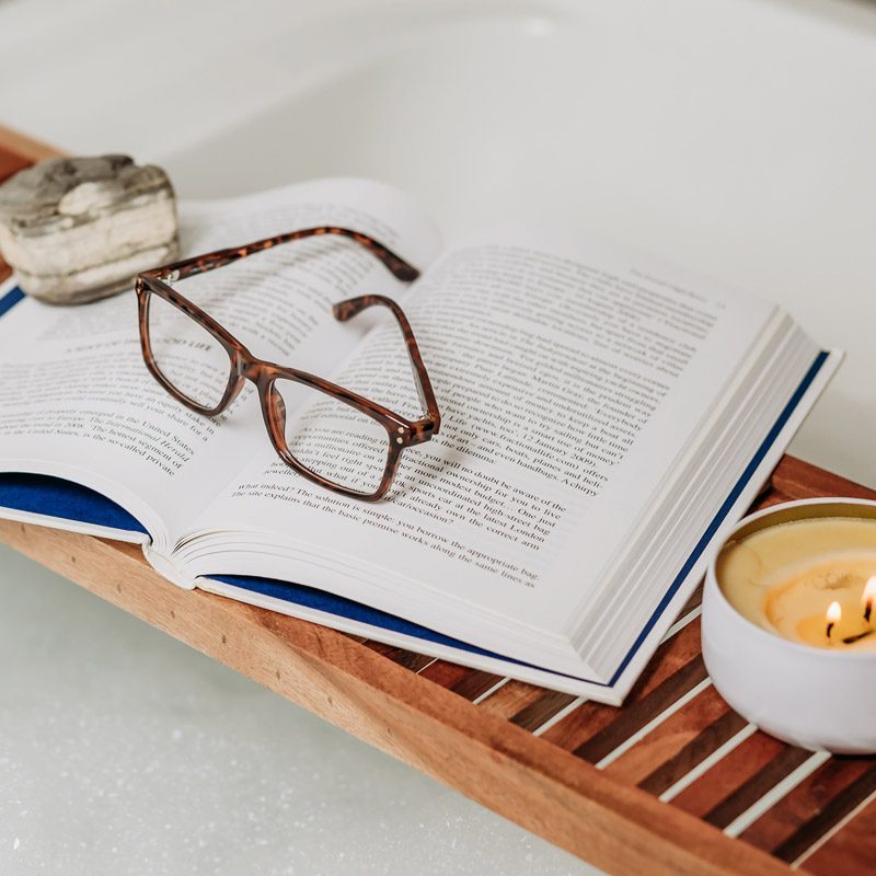 Pair Of Full Frame Reading Glasses On A Book Pair Of Full Frame Reading Glasses On A Book